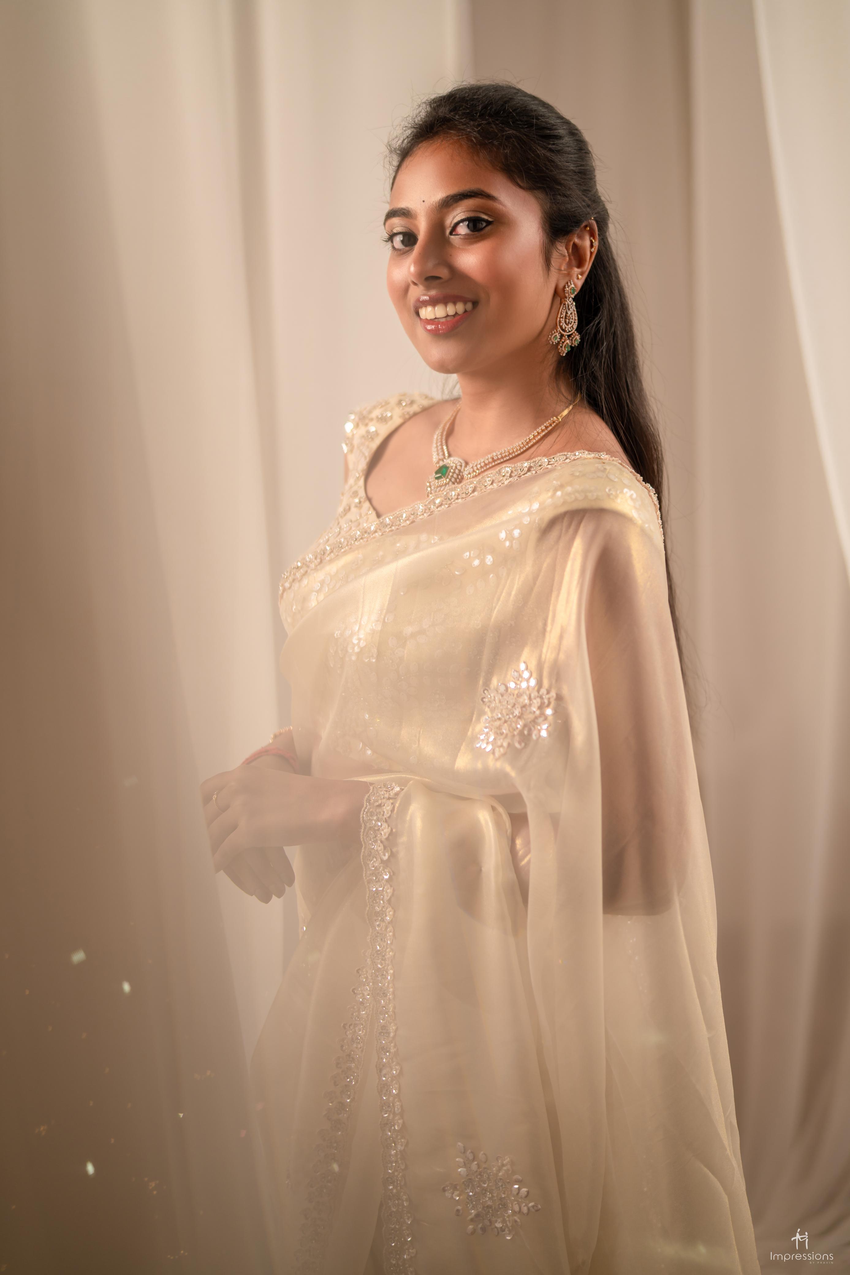 Juhi Murugeshan in a saree